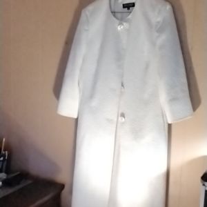 A cream dress suit